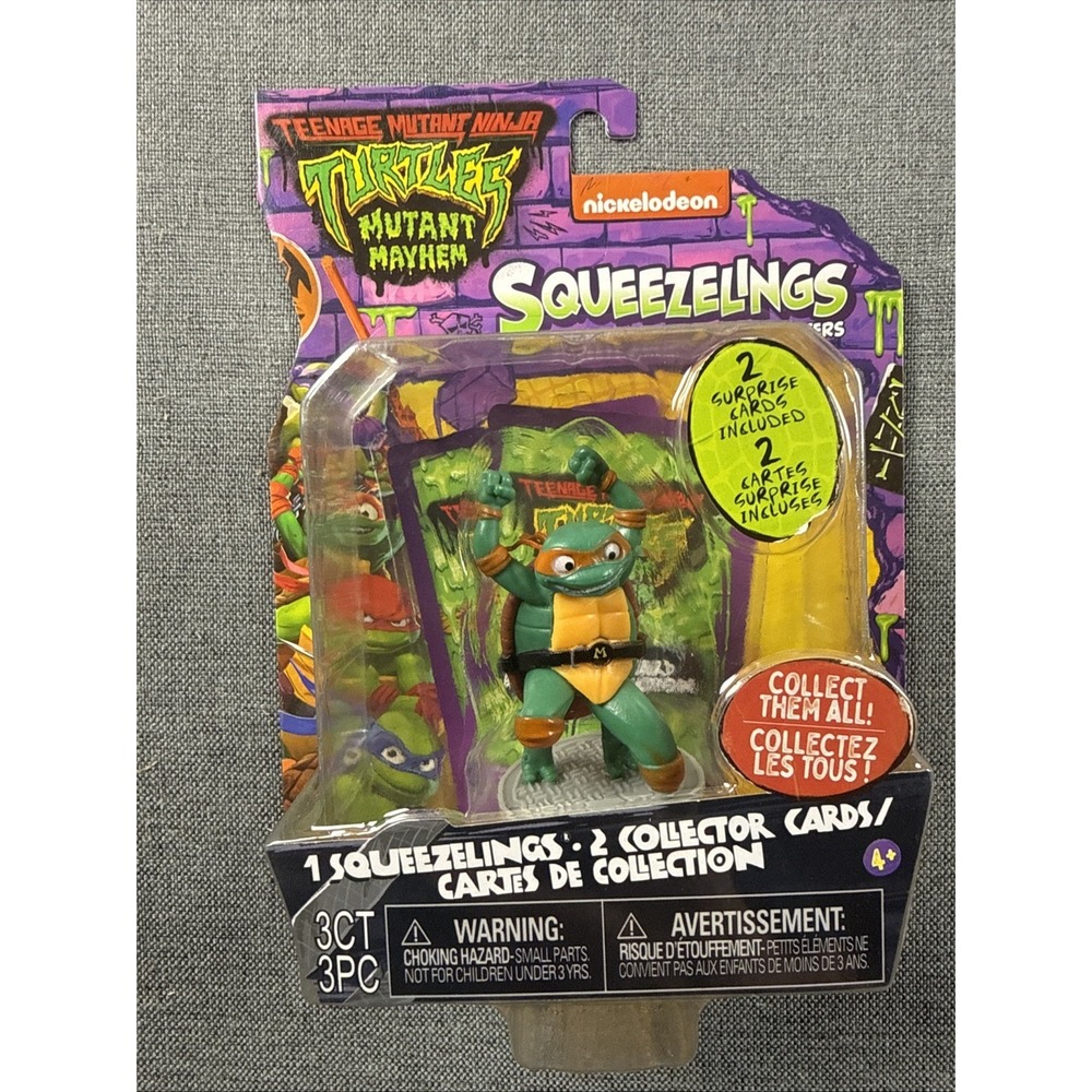 TMNT Mutant Mayhem Squeezelings Michelangelo Figure w Cards Nickelodeon